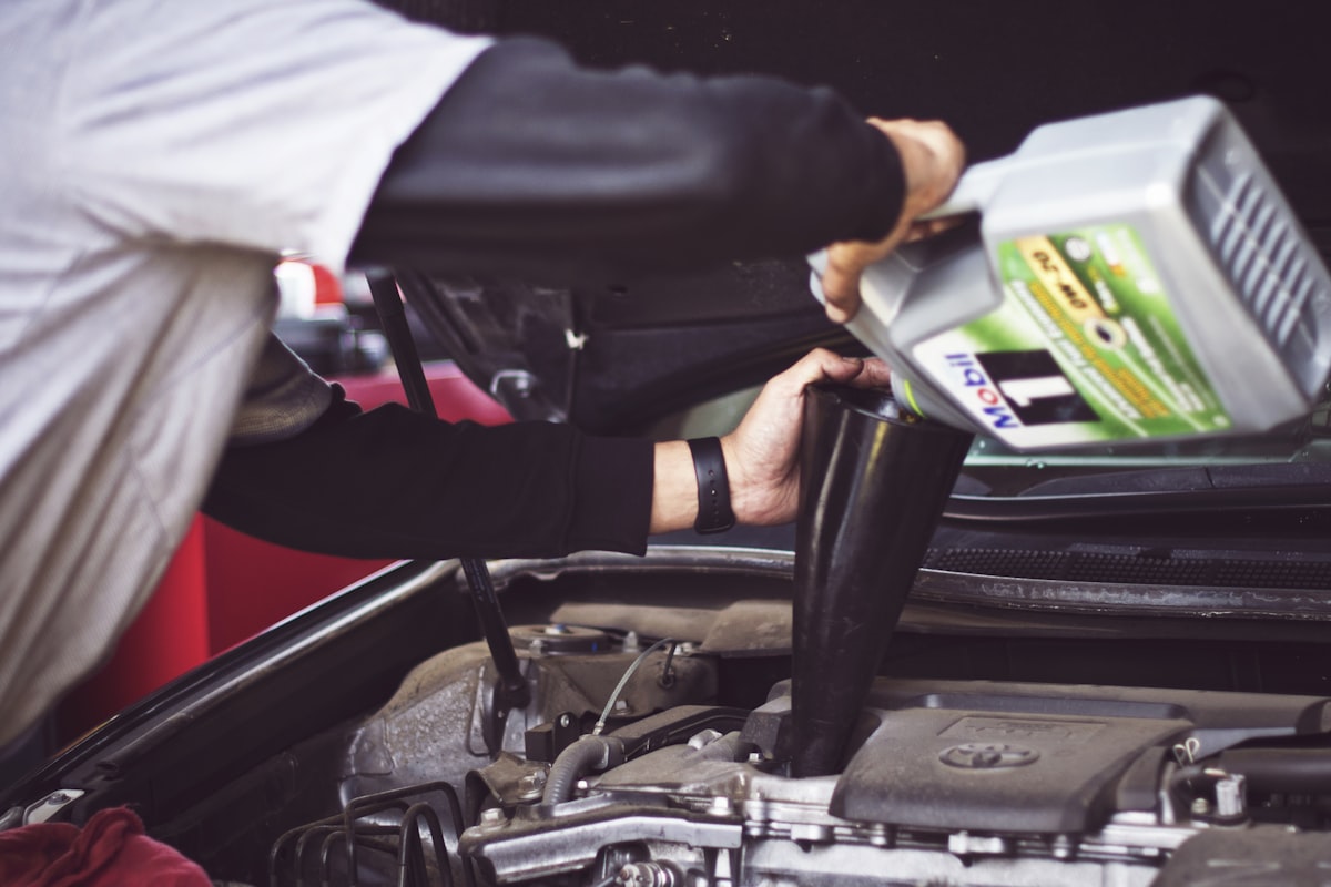 Mechanic working on a car engine